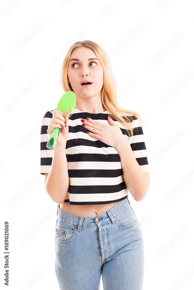 Girl sing song in hairbrush isolated Girl sing song in hairbrush isolated