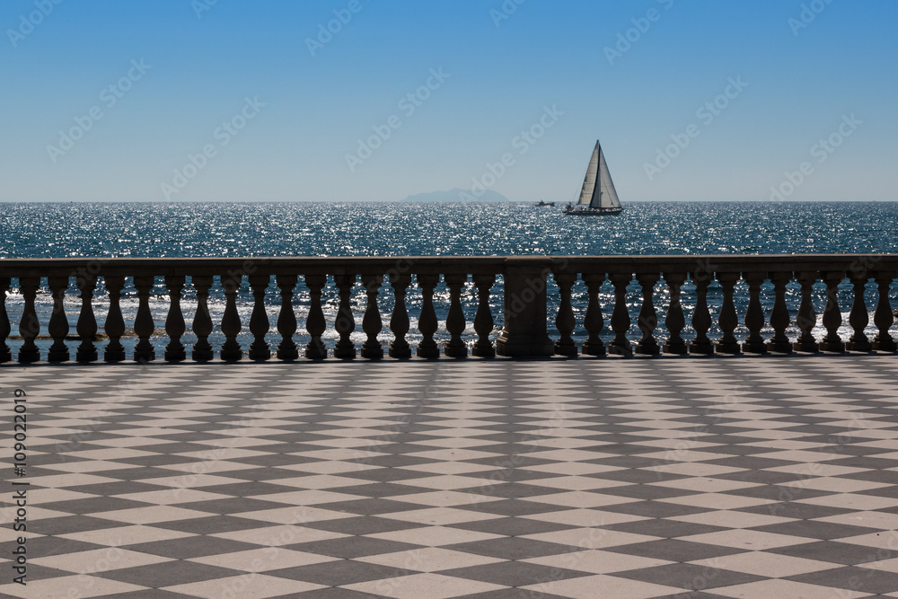 Livorno' s Mascagni Terrace and White Sailing Boat in Background