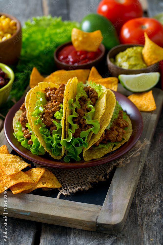 plate of tacos, nachos and tomato dip plate of tacos, nachos and tomato dip