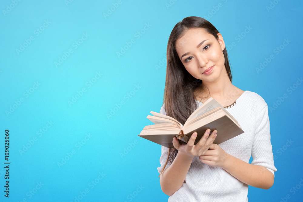 Woman university / college student holding book Woman university / college student holding book