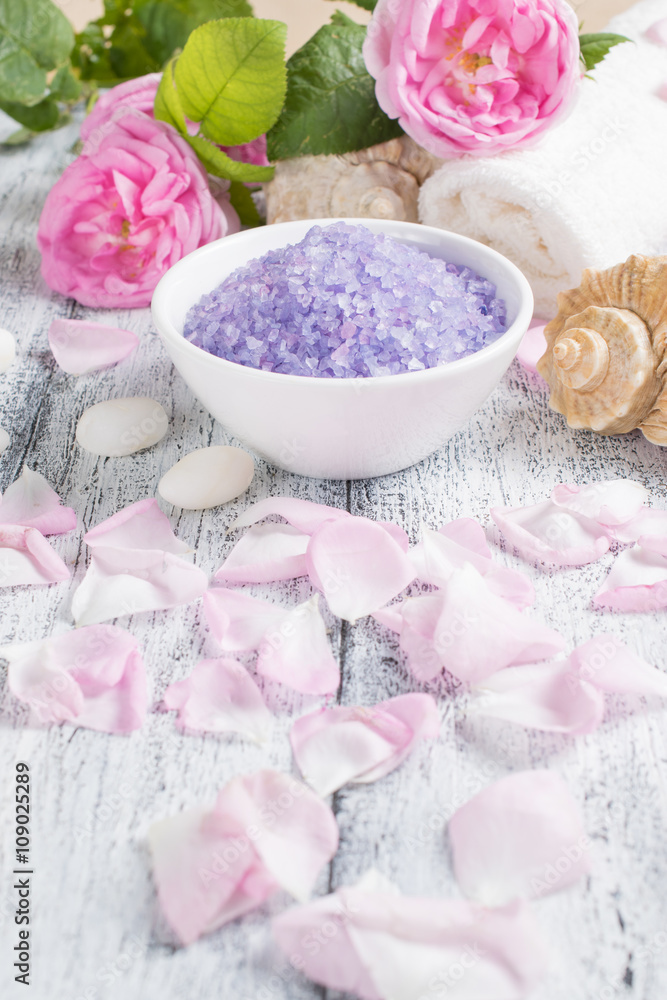 Spa salon with sea salt, towel and roses Spa salon with sea salt, towel and roses