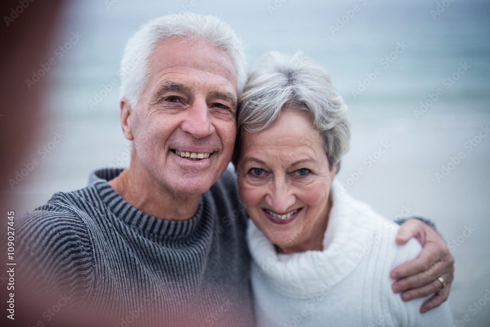 Portrait of happy senior couple embracing each other Portrait of happy senior couple embracing each other