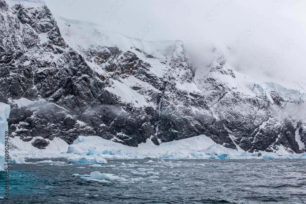 Fantastic landscapes of beautiful snow-capped mountains,  ocean, Antarctica