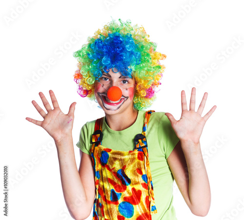 Girl dressed as a clown isolated