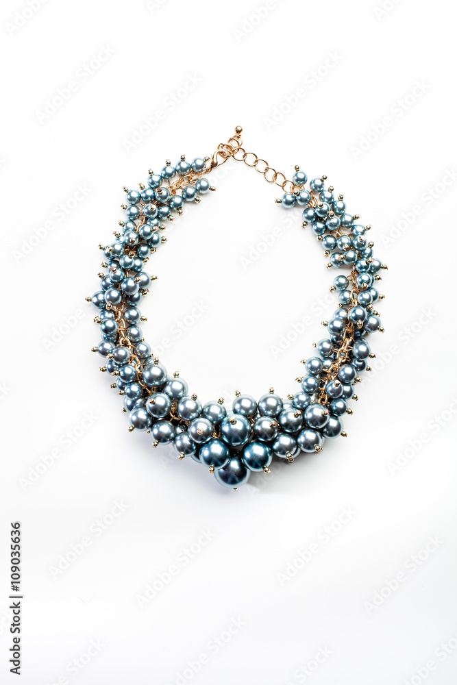 necklace of beads and gold chains isolated necklace of beads and gold chains isolated