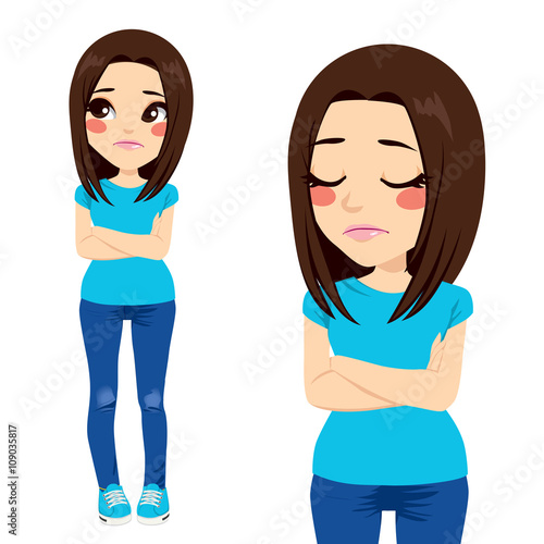 Sad teenager girl with crossed arms and lonely expression