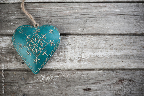 Weathered wooden background with heart