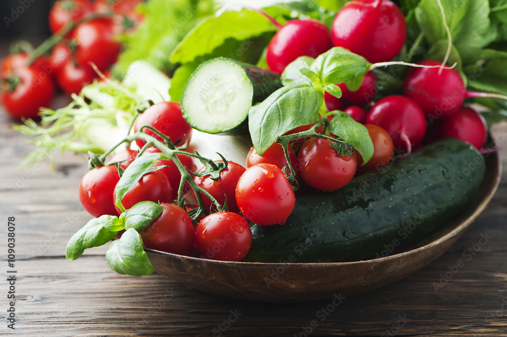 Mix of fresh vegetables on the wooden table Mix of fresh vegetables on the wooden table