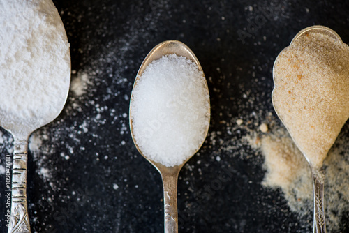 Photos Different Kinds of Sugar in the Spoons