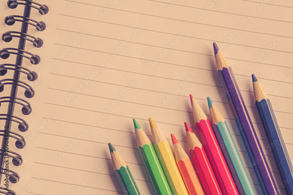 Colorful pencils on linear paper Colorful pencils on linear paper