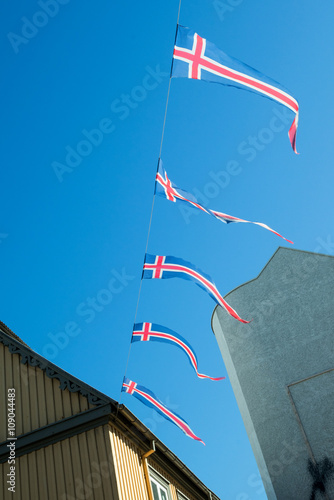 Iceland flags hanging on a wire