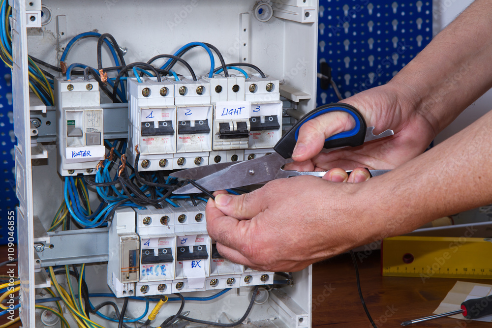 electrician at work with an appliance