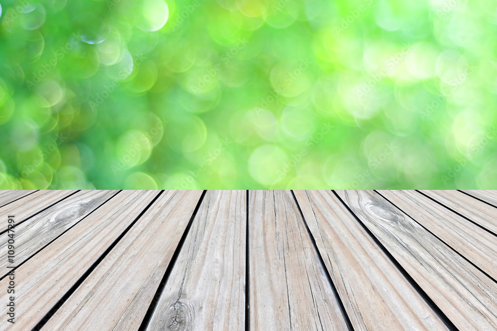 Perspective wood over blur park with bokeh background Perspective wood over blur park with bokeh background