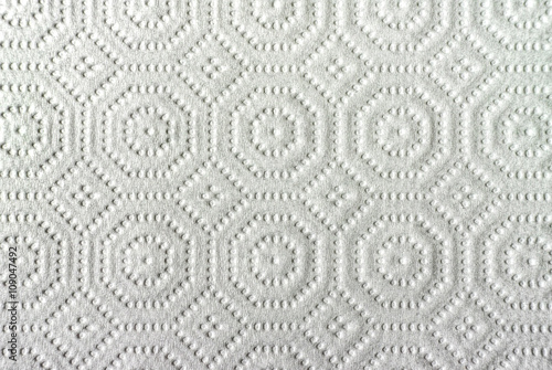 White paper towel.Close-up view of ornamented paper napkin  texture background.
