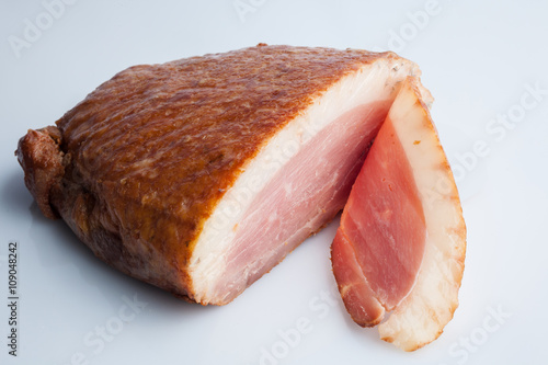 Smoked sliced duck breast on white background