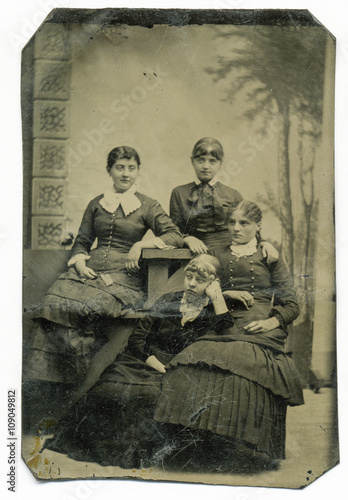 Obraz na plátně Tintype, circa 1880, USA, of girls posed in studio