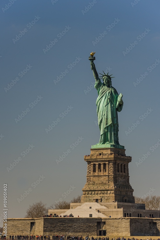 Fototapeta premium new York, USA - Circa March 2016 - visiting the statue of libert