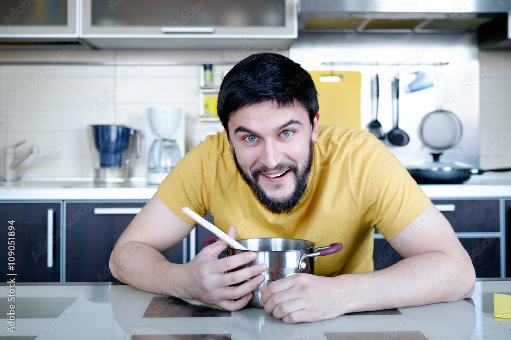 Bearded man in the kitchen Bearded man in the kitchen