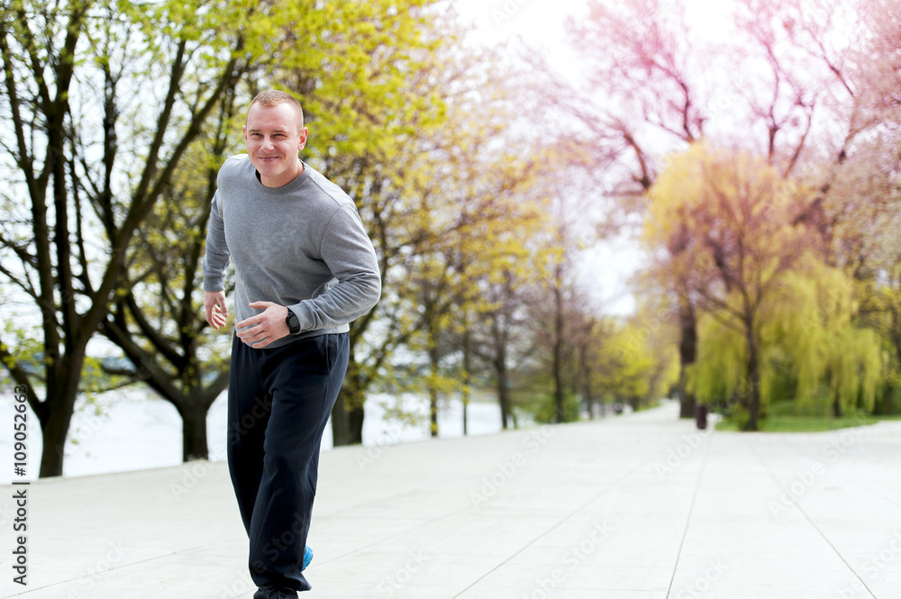 Young man training run outdoor.