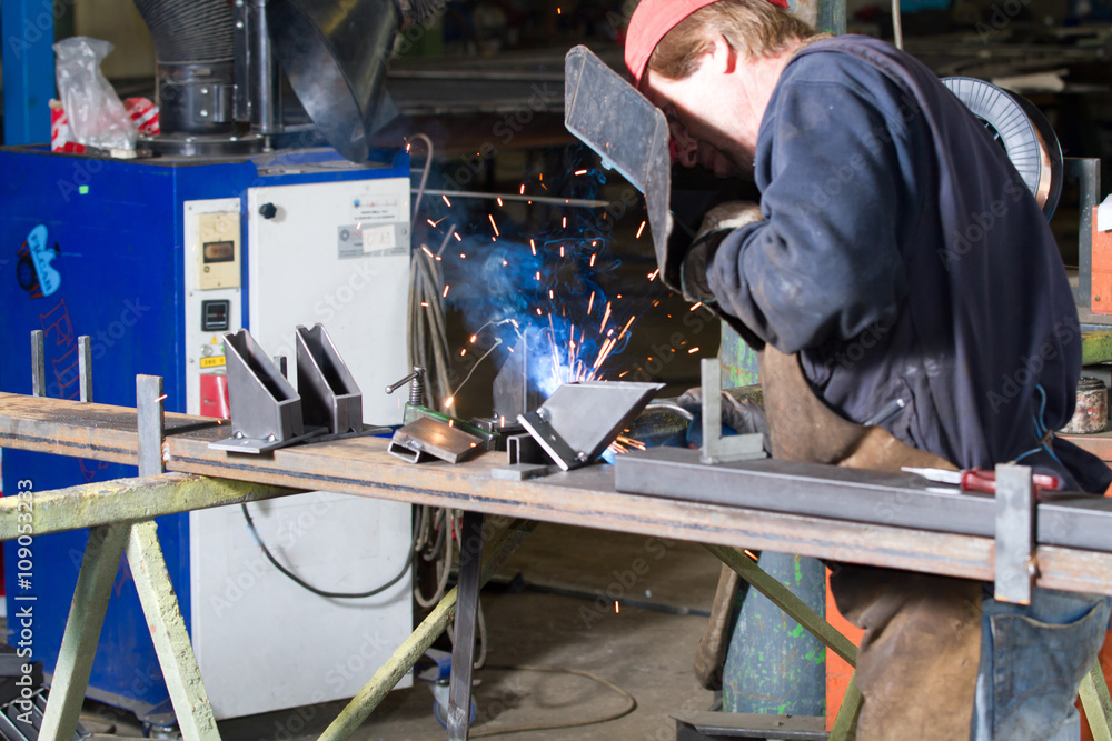 metalworker at work in his workshop metalworker at work in his workshop
