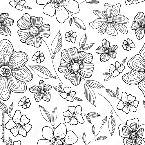 Doodle flowers seamless pattern. Zentangle style flowers and leaves background. Black and white hand drawn herbal pattern.