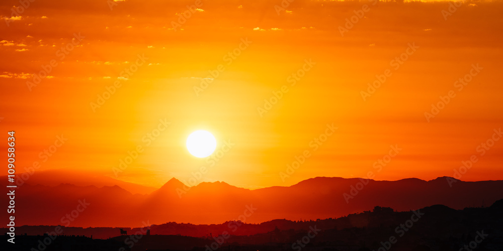 Amazing Sunset Sunrise With Sun Over Dark Mountain Ground Silhou
