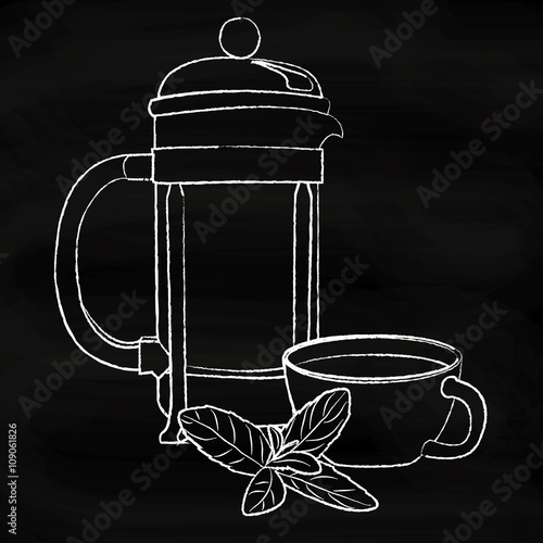 French press, cup and tea leaf on chalkboard
