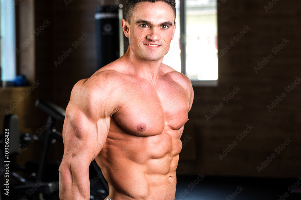 Strong Athletic Man Fitness Model Torso showing six pack abs Strong Athletic Man Fitness Model Torso showing six pack abs