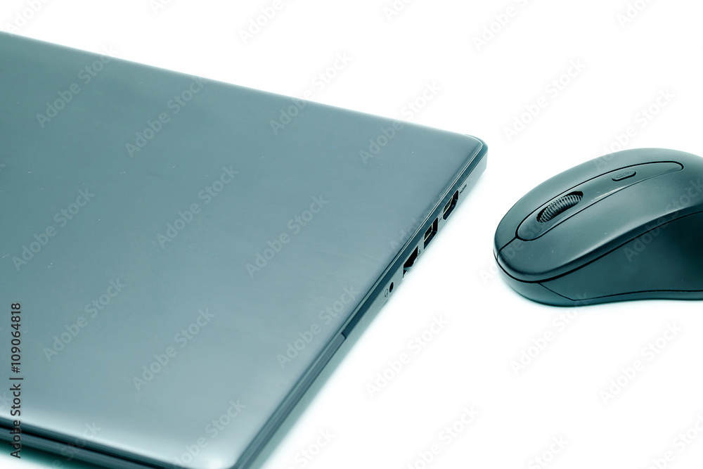 Laptop and mouse. Laptop and mouse.