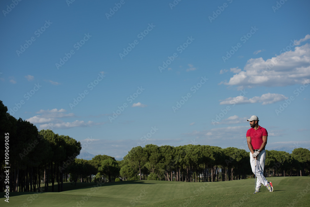 handsome middle eastern golf player portrait at course