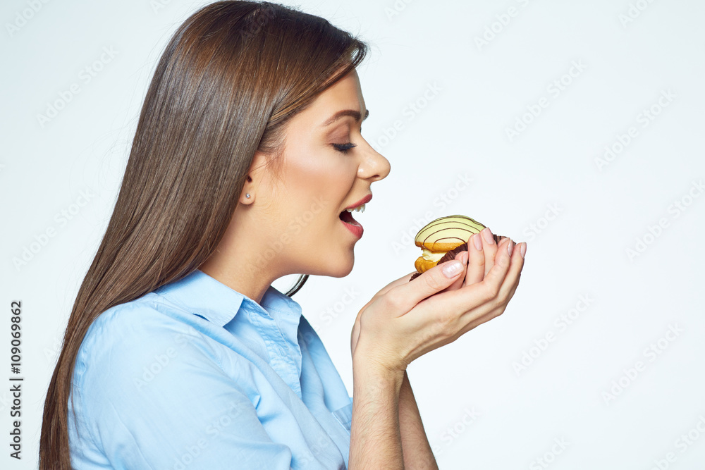 Close up face portrait of young woman with cookies. Close up face portrait of young woman with cookies.