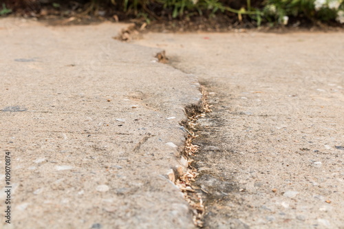 crack on asphalt road texture © yozachika