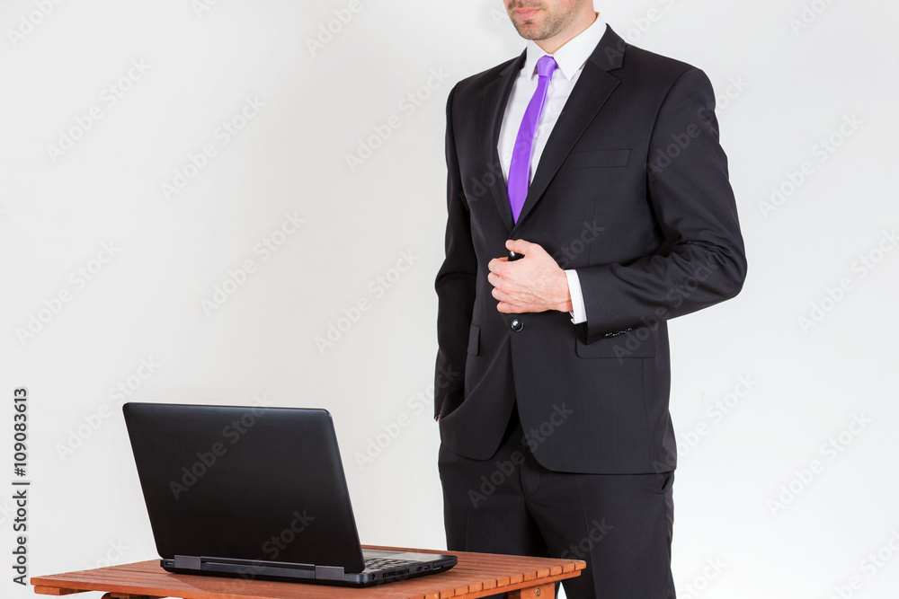 Anonyme business man looking on a notebook Anonyme business man looking on a notebook