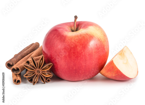 Apple, anis and cinnamon isolated on white background