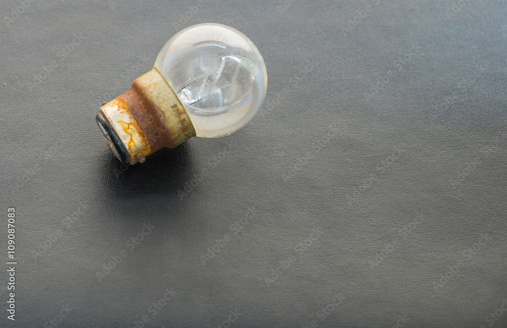 Light bulbs on leather background Light bulbs on leather background