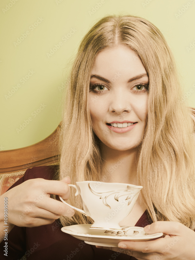 Woman drinking hot coffee beverage. Caffeine. Woman drinking hot coffee beverage. Caffeine.