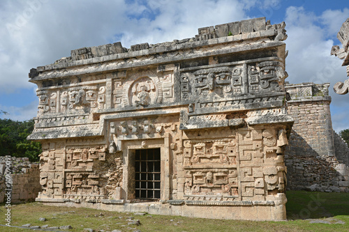 Church and temple of reliefs in Chichen Itza. photo