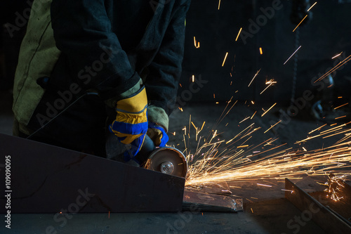 worker welding metal 