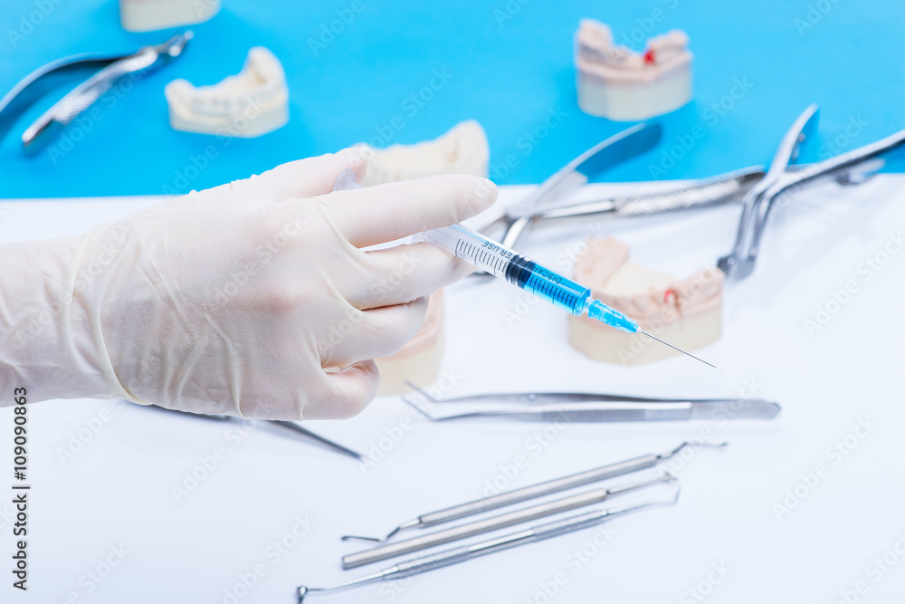 Dentist shows how to do the injection Dentist shows how to do the injection