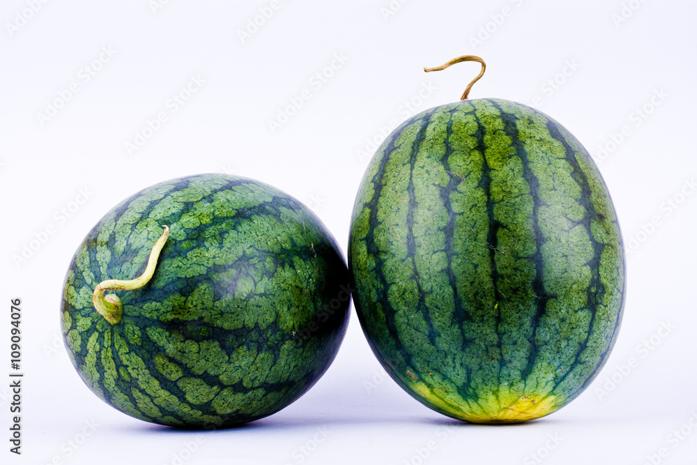 Watermelon rind on the outside is green and beautiful striped. Watermelon rind on the outside is green and beautiful striped.