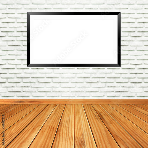 Blank billboard frame on brick wall © itim2101