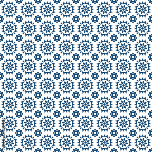 Seamless background image of vintage blue round cross flower