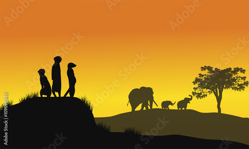 Silhouette of weasel and elephant