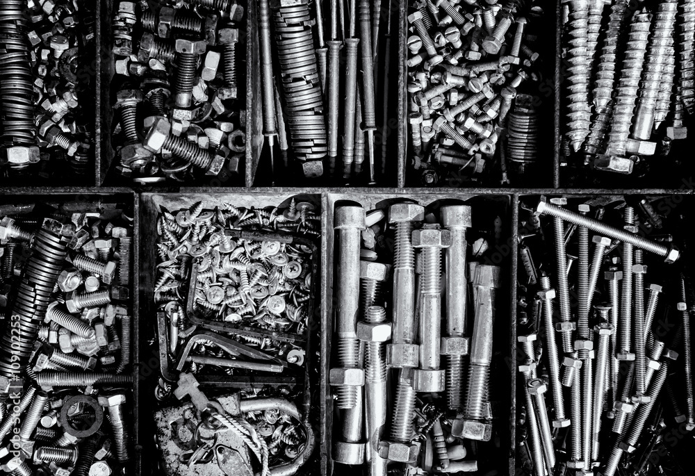 Obraz premium Industrial Nut Bolts and Washers Background