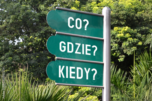 Co? Gdzie? Kiedy? Signpost in Polish. photo