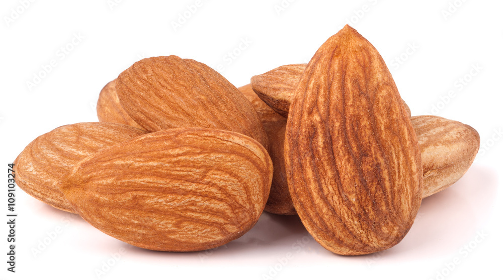heap of almonds isolated on white background heap of almonds isolated on white background