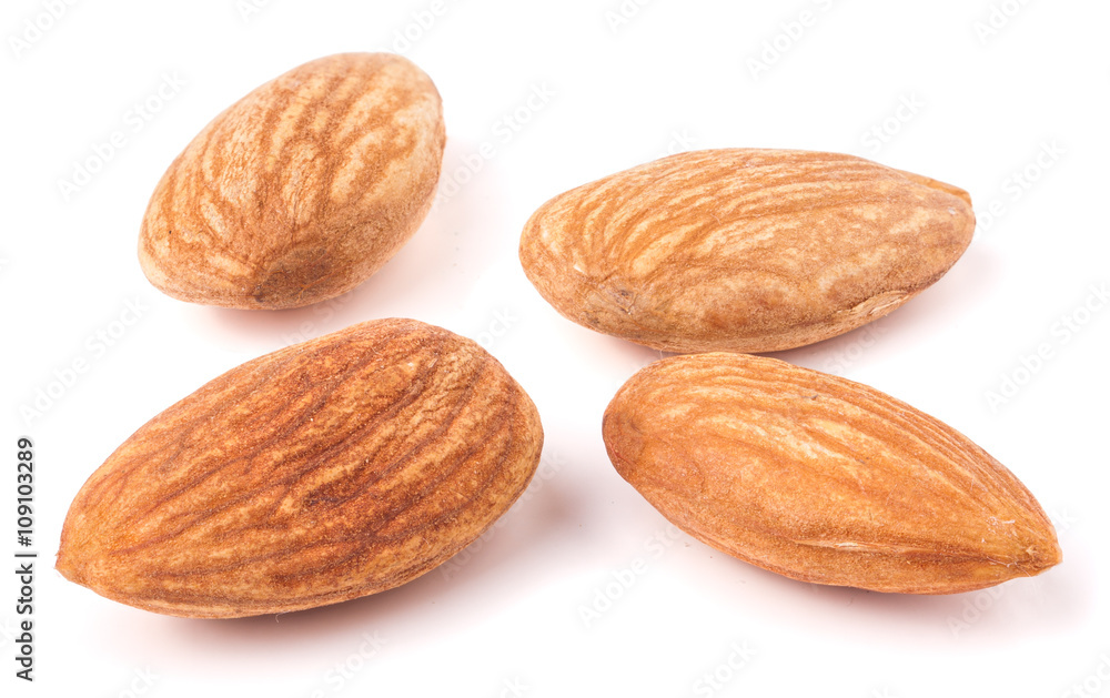 four almond isolated on white background close-up macro four almond isolated on white background close-up macro