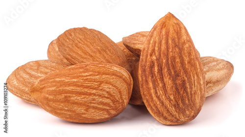 heap of almonds isolated on white background