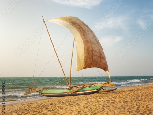 Fishermen's Catamaran on the Beaach near Negombo, Sri Lanka © t_o_m_o