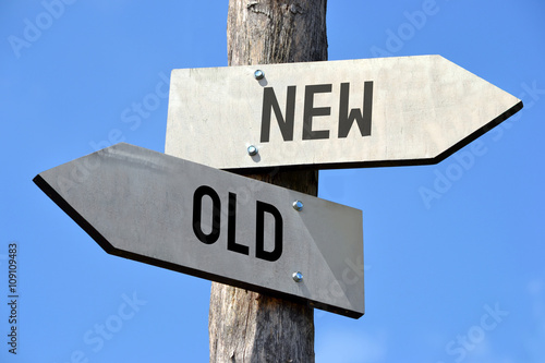 Old and new signpost